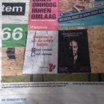 posters in De Volkskrant